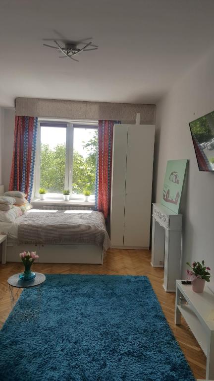 Posteľ alebo postele v izbe v ubytovaní Apartament Waszyngtona