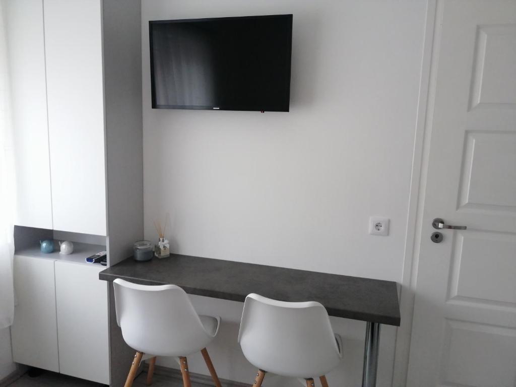 TV a/nebo společenská místnost v ubytování Werner Apartman