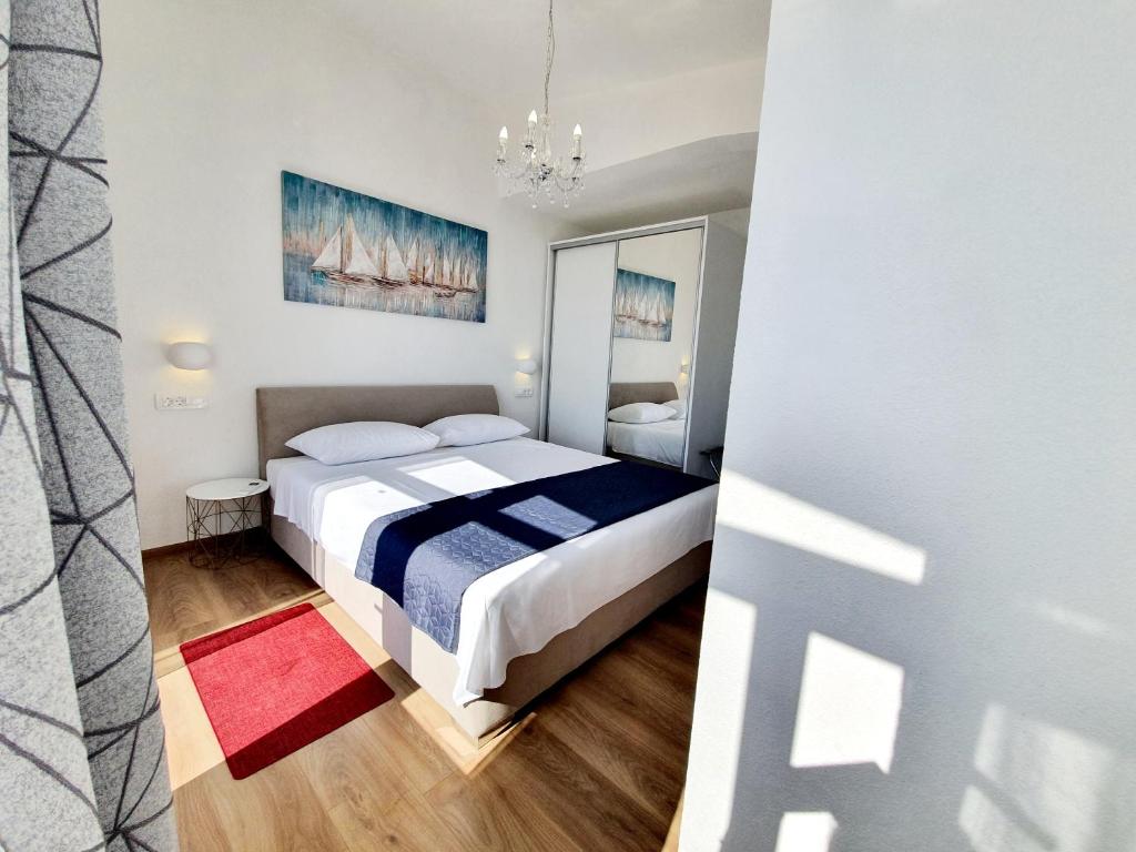 Postel nebo postele na pokoji v ubytování White House apartments