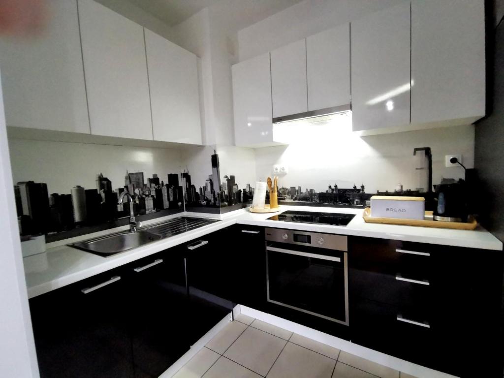 Kuchyňa alebo kuchynka v ubytovaní Apartman Elly