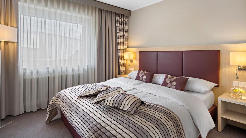 Postel nebo postele na pokoji v ubytování Hotel Diehlberg