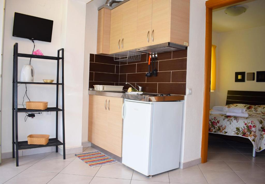 Kuchyň nebo kuchyňský kout v ubytování Villa Margarita