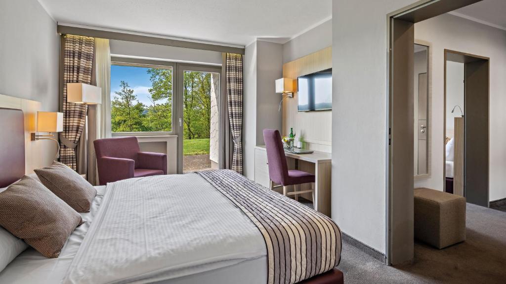 Postel nebo postele na pokoji v ubytování Hotel Diehlberg