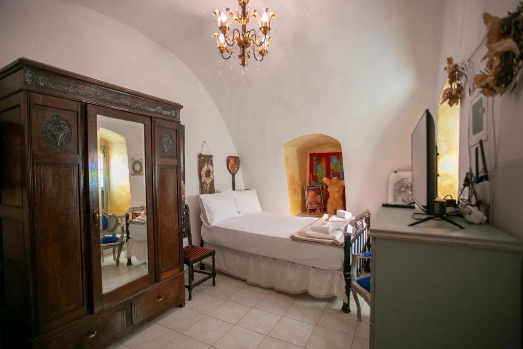 Posteľ alebo postele v izbe v ubytovaní Charouda country house