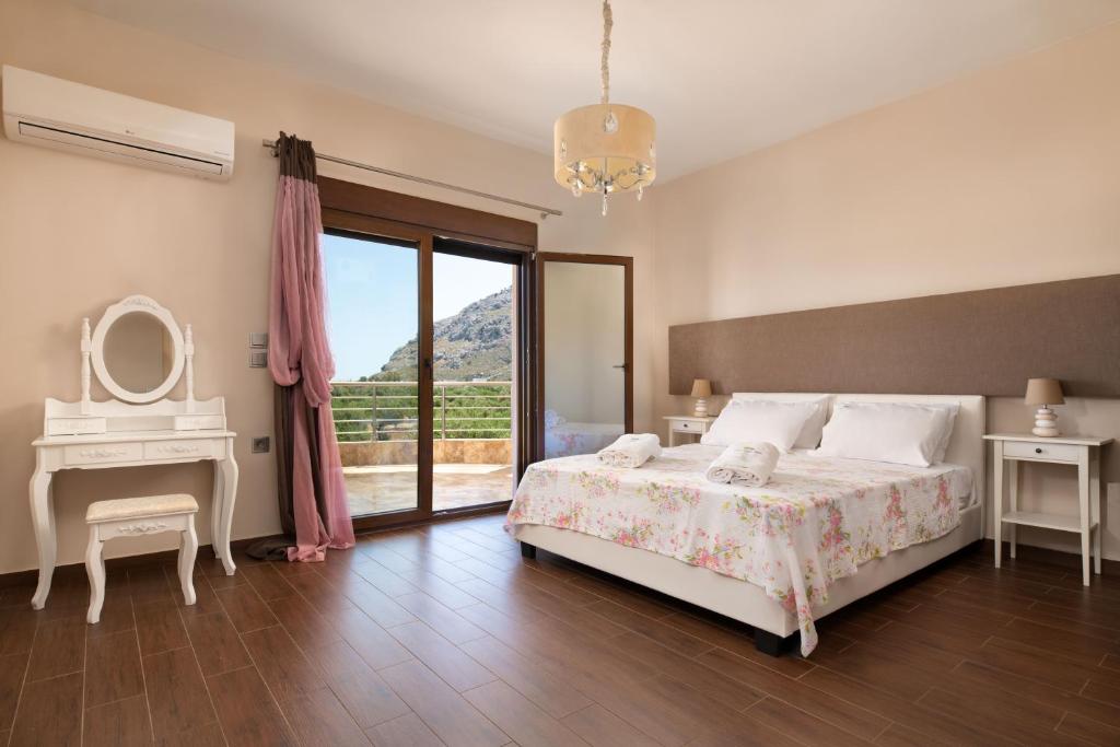 Łóżko lub łóżka w pokoju w obiekcie Costa Costa Villa - Luxury villa
