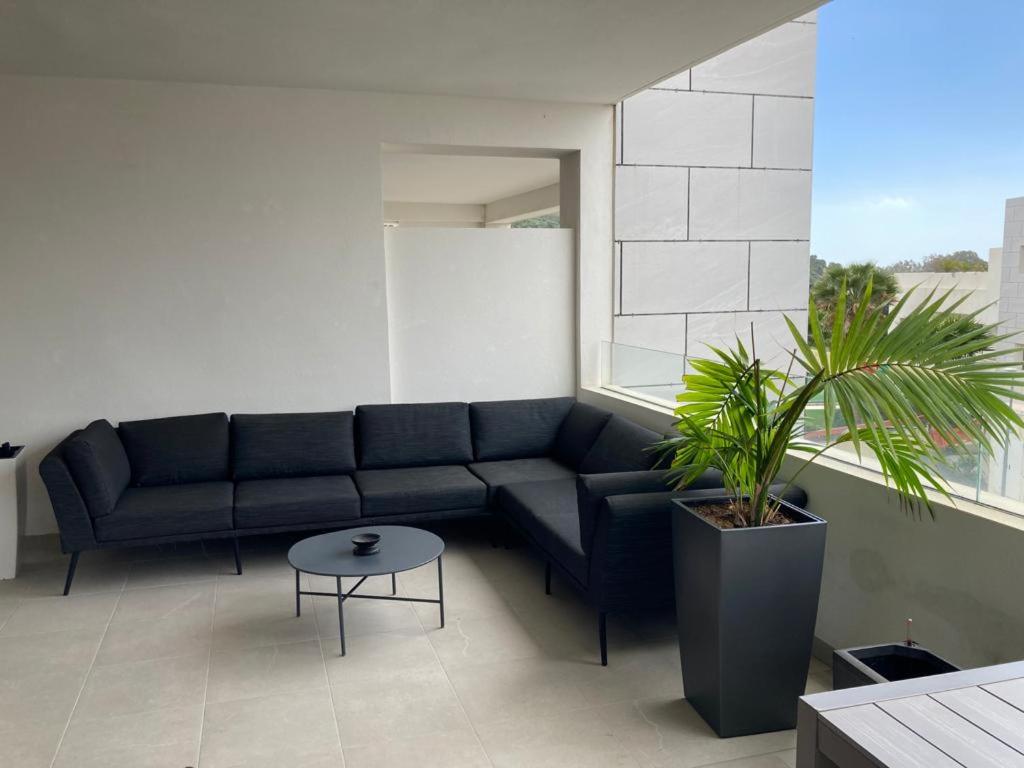 Posedenie v ubytovaní Appartement Casares - Mer, Golf, Piscine, Padel - FINCA CORTESIN