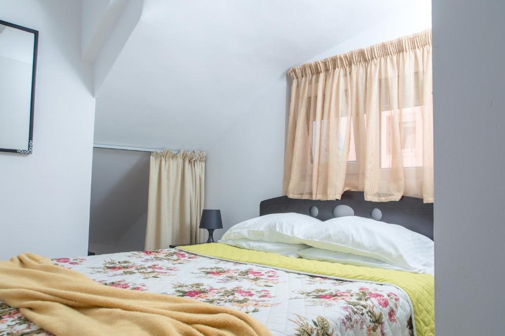 Postel nebo postele na pokoji v ubytování Villa Margarita