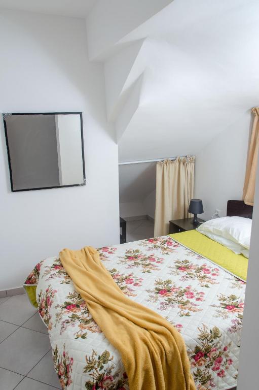 Postel nebo postele na pokoji v ubytování Villa Margarita