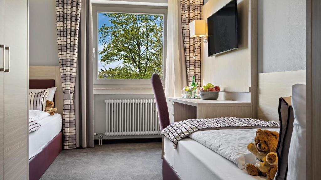 Postel nebo postele na pokoji v ubytování Hotel Diehlberg