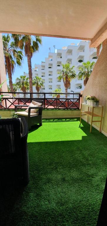 A balcony or terrace at Spectacular Renovated Apartment, 5 min to Camison Beach, with AirCon