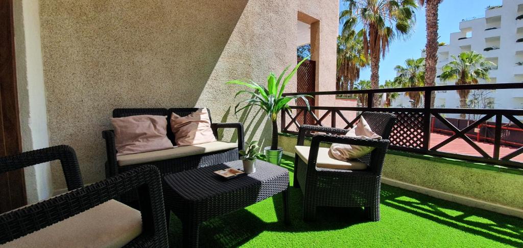 A balcony or terrace at Spectacular Renovated Apartment, 5 min to Camison Beach, with AirCon
