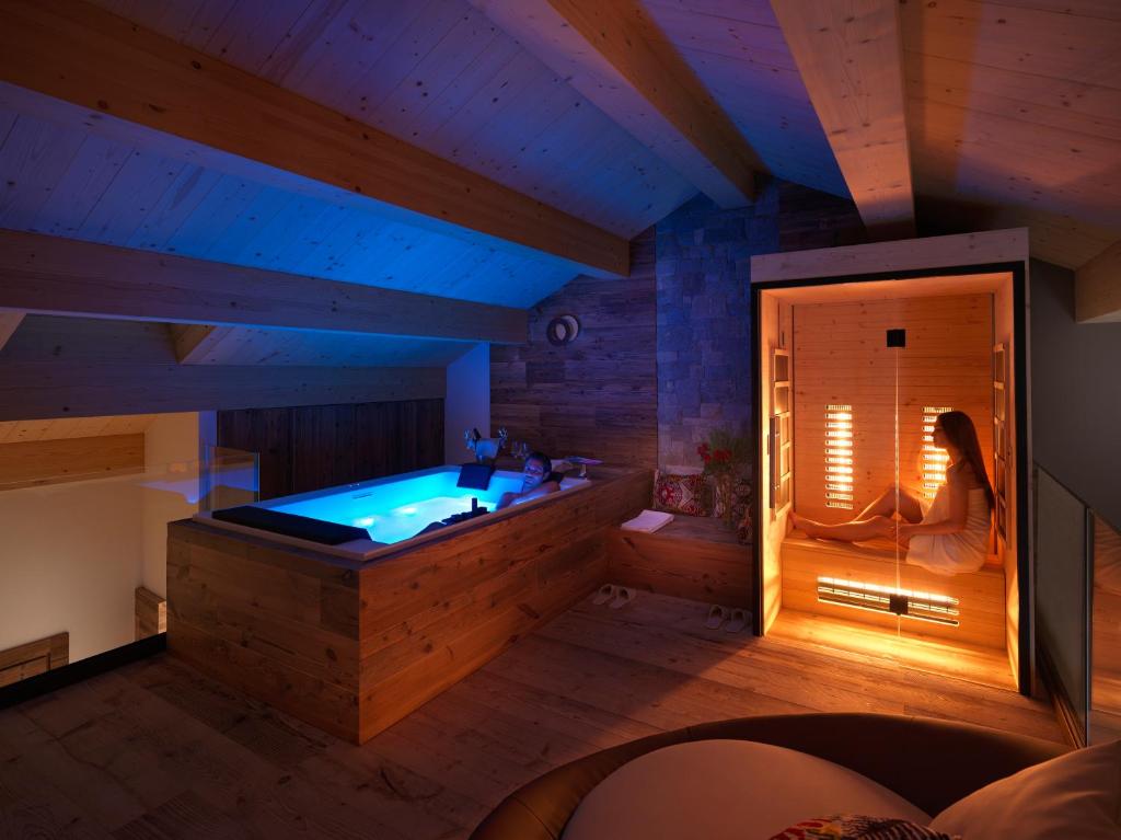 Posteľ alebo postele v izbe v ubytovaní RESORT VALFORMICA