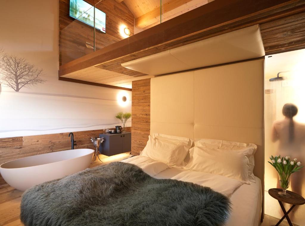 Posteľ alebo postele v izbe v ubytovaní RESORT VALFORMICA