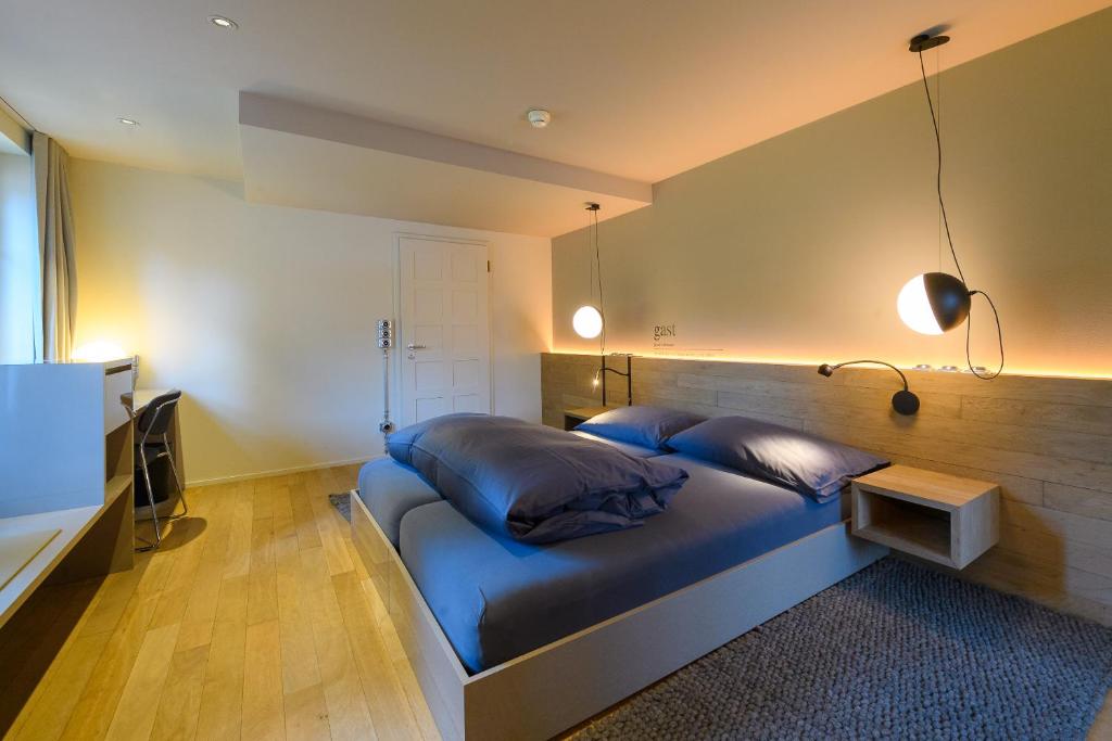 Ein Bett oder Betten in einem Zimmer der Unterkunft Landhotel Linde Fislisbach