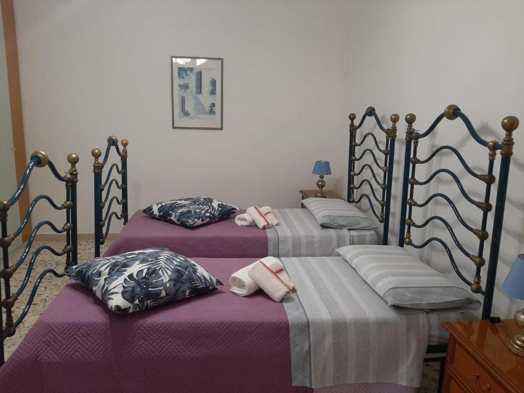 A bed or beds in a room at interno13bari