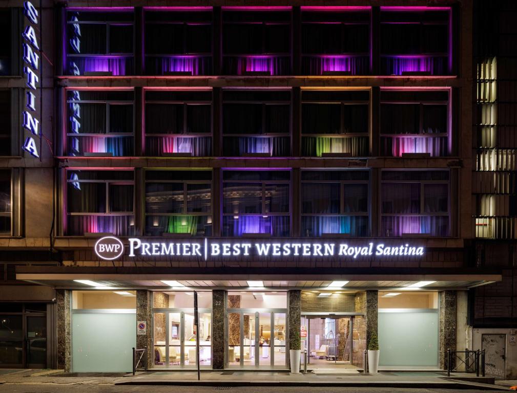 a large building with a lot of windows at Best Western Premier Hotel Royal Santina in Rome