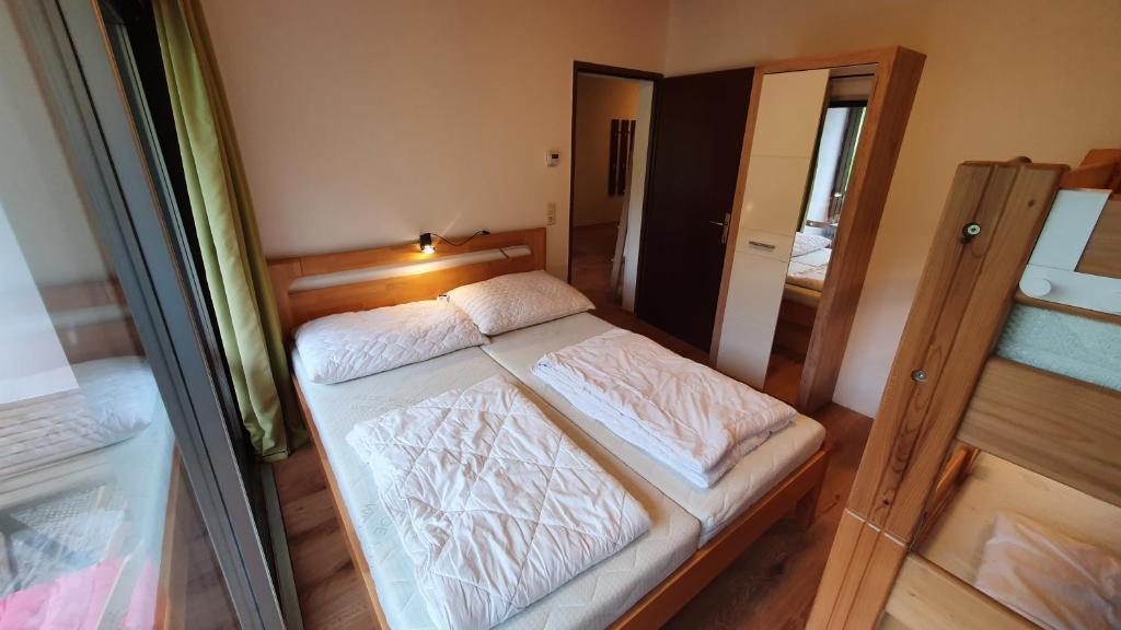 Postel nebo postele na pokoji v ubytování Apartmán Tauplitz