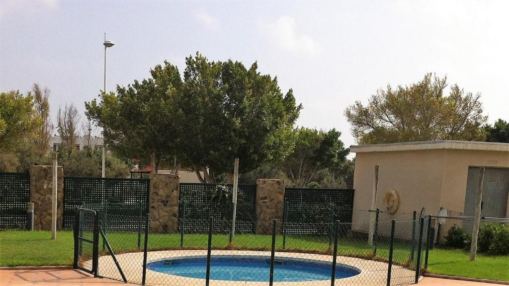 Bazén v ubytování oasis del toyo golf&beach private garden wifi nebo v jeho okolí