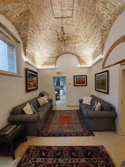 A seating area at Casa Santa Maria - Beautifully restored house in centro storico Irsina Basilicata Puglia