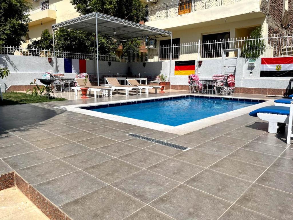 Bazén v ubytování Luxor Oasis Guest House nebo v jeho okolí