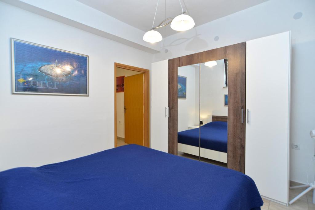 Postel nebo postele na pokoji v ubytování Apartments Branislav 1927