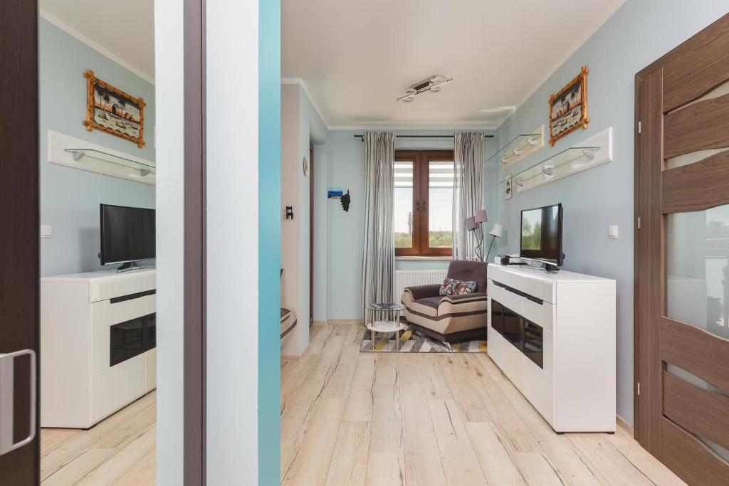 Kuchyňa alebo kuchynka v ubytovaní Apartment Na Zakolu Wisły by Noclegi Renters