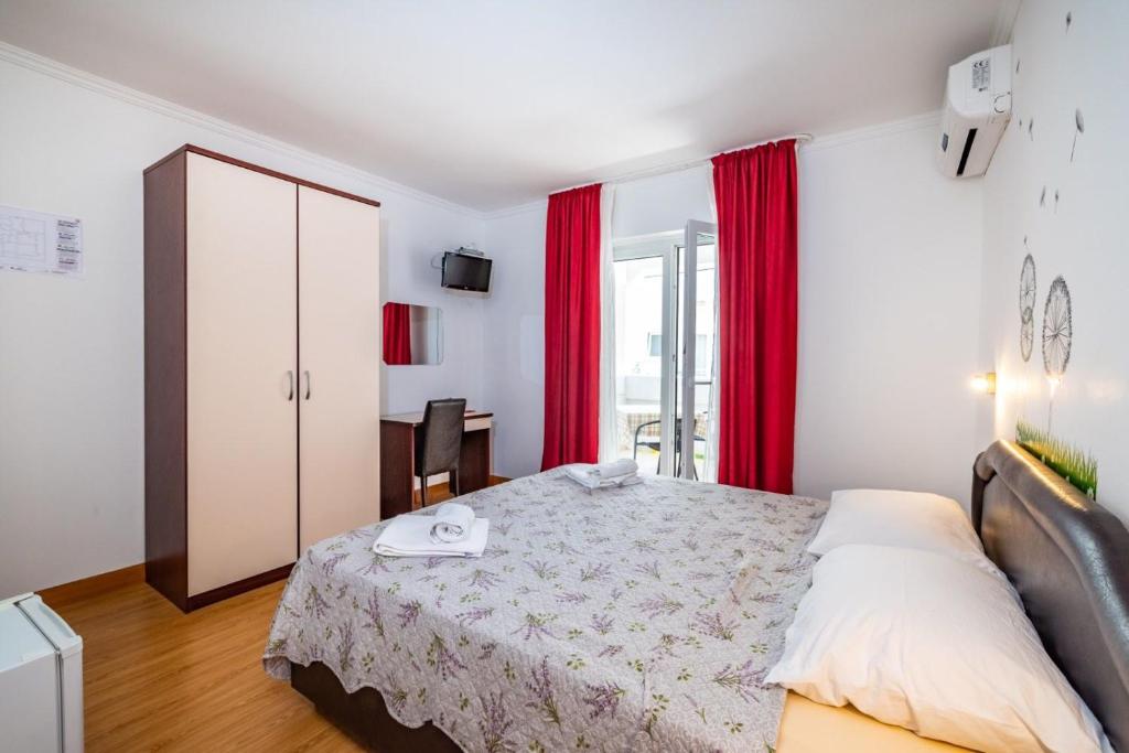 Postel nebo postele na pokoji v ubytování Villa Sunce