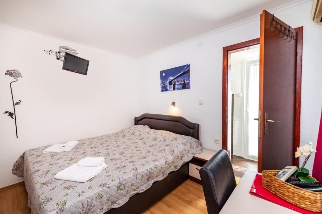 Postel nebo postele na pokoji v ubytování Villa Sunce