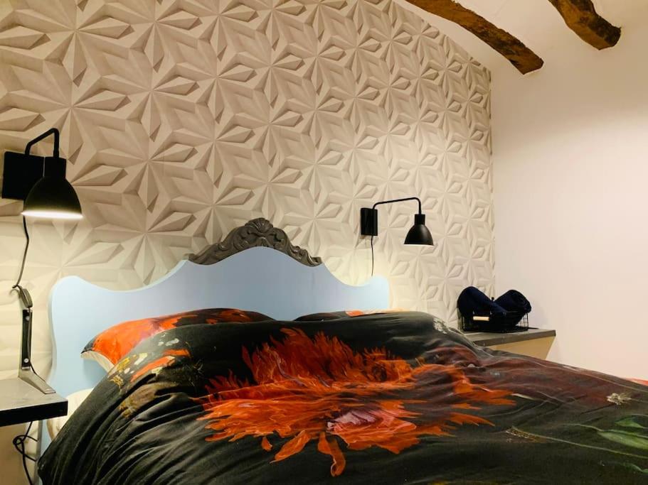 Кровать или кровати в номере Casa del Aire - Patio Apartment