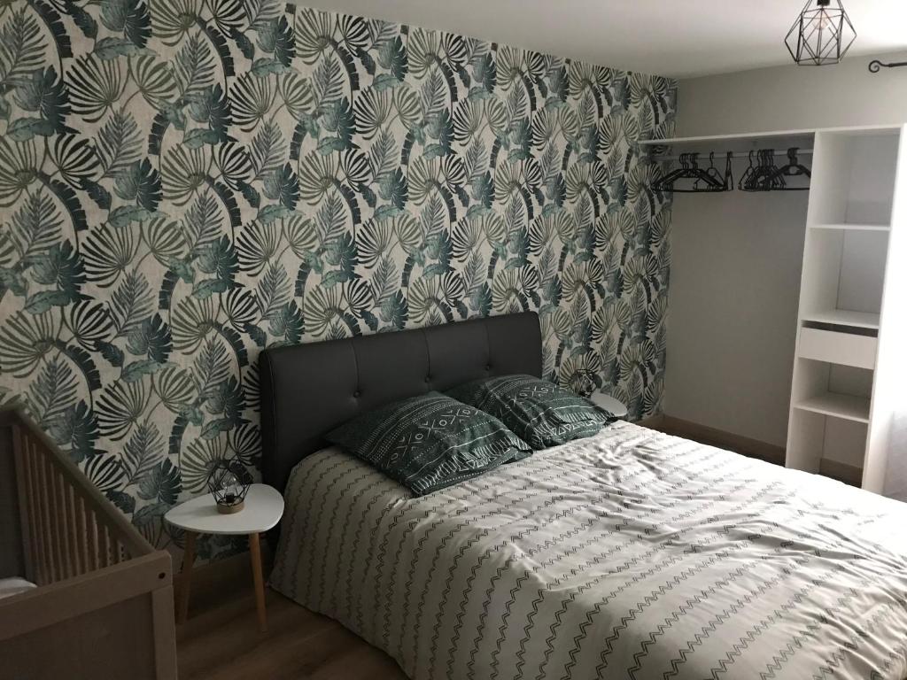 Postel nebo postele na pokoji v ubytování Gîte des falaises
