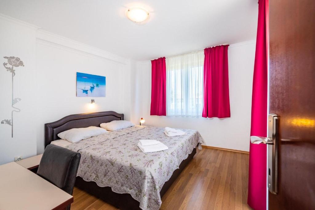 Postel nebo postele na pokoji v ubytování Villa Sunce