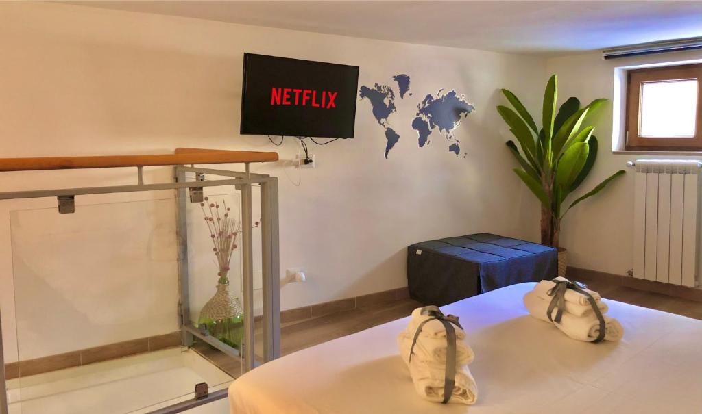 Posteľ alebo postele v izbe v ubytovaní STAZIONE BARI CENTRALE - Appartamento Moderno - Netflix & Amazon Prime Video