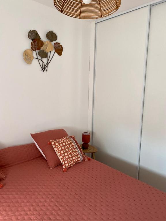 Posteľ alebo postele v izbe v ubytovaní Petite maison en pierre