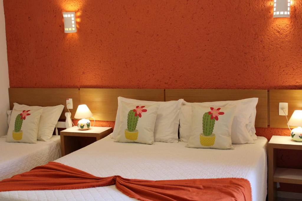 Cama ou camas em um quarto em Pousada Dom Capudi