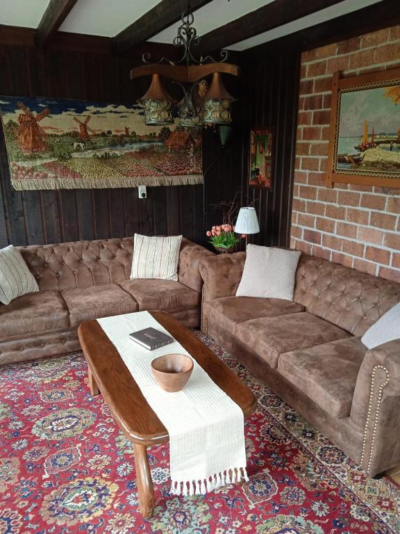 Posezení v ubytování Vakantiehuis Friedeburg