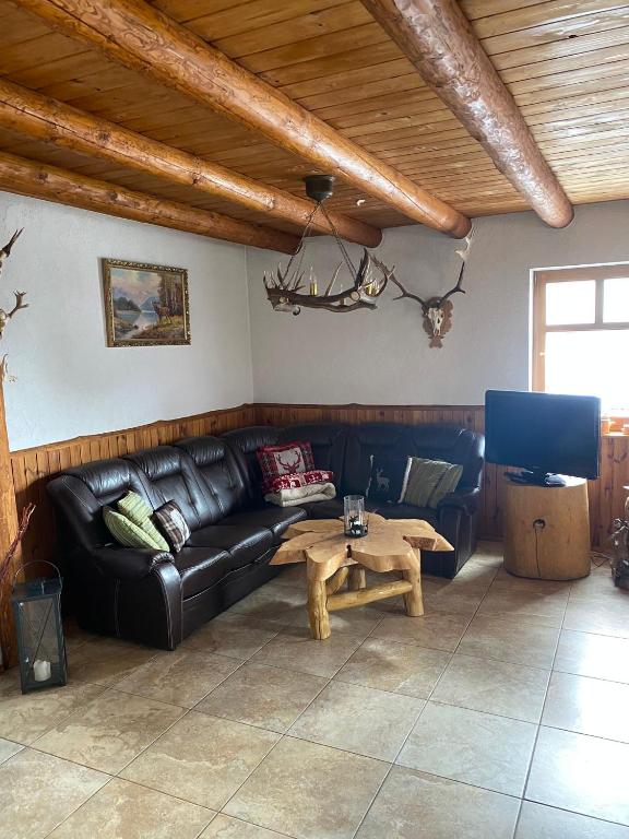 Posezení v ubytování Jagdhaus auf dem Forsthof mit Sauna