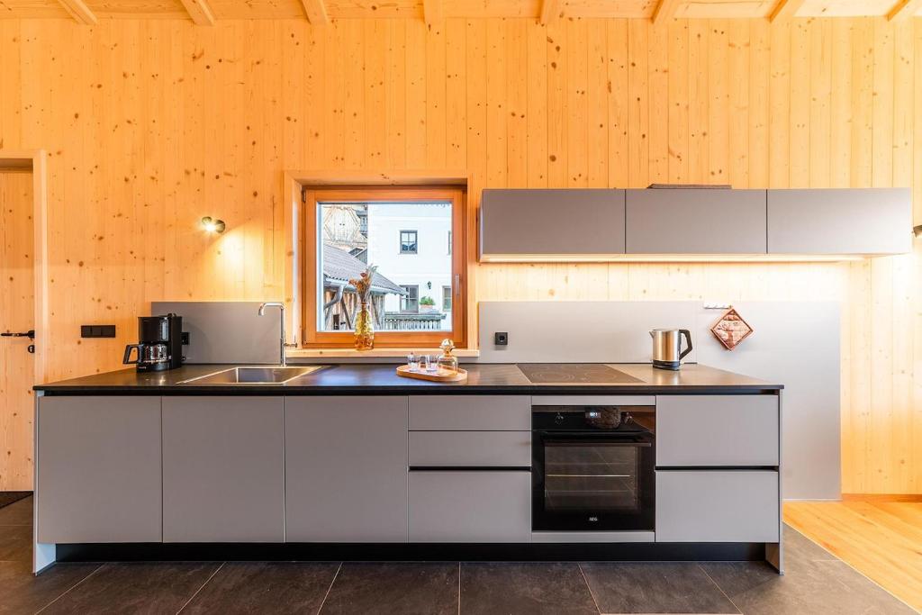 Kuchyň nebo kuchyňský kout v ubytování Ratscheinerhof App Waldruhe