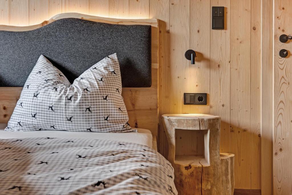 Postel nebo postele na pokoji v ubytování Ratscheinerhof App Waldruhe