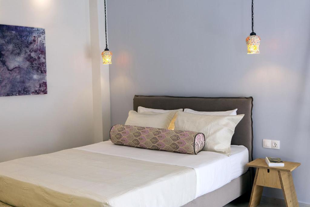 Posteľ alebo postele v izbe v ubytovaní Edward Art Boutique Hotel