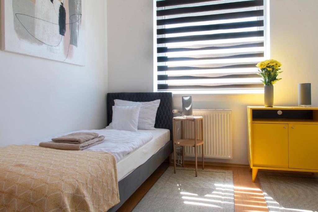 Posteľ alebo postele v izbe v ubytovaní Balaton Lakeside Residence