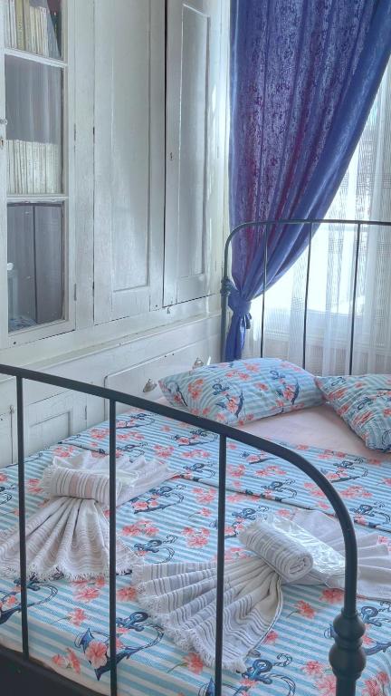 A bed or beds in a room at Eolya Konuk Evi