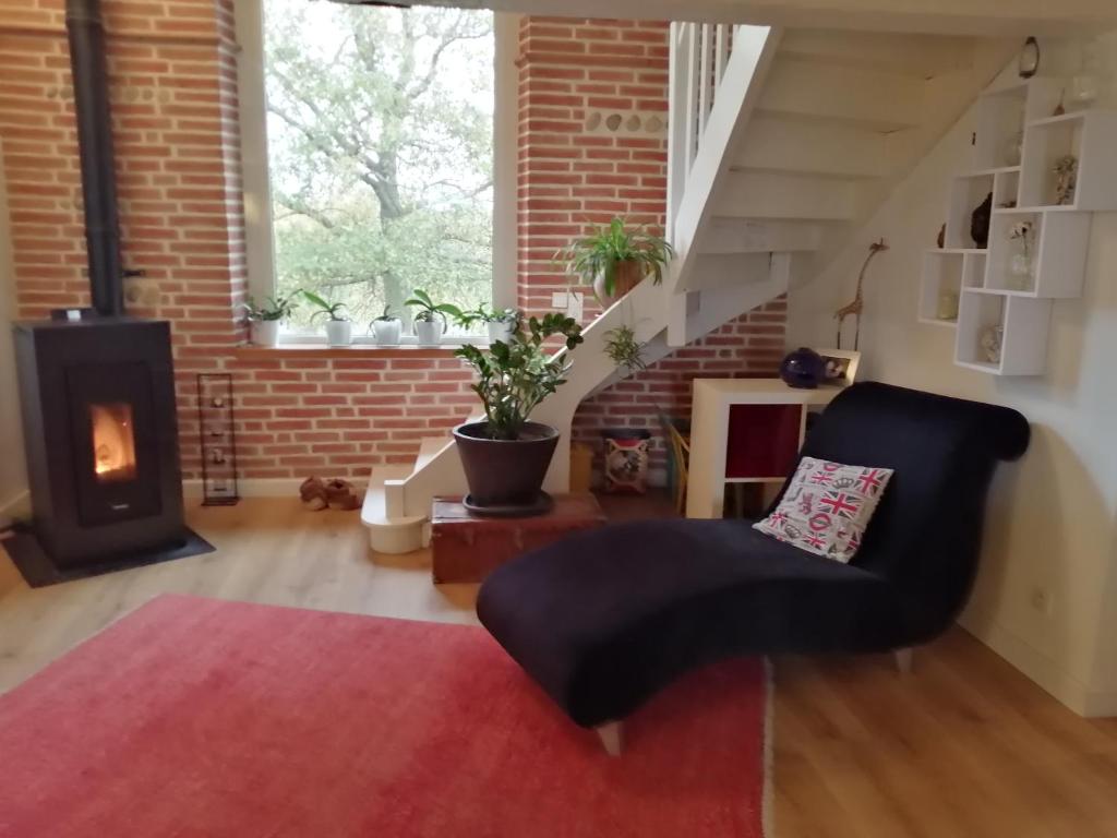 Posezení v ubytování Maison avec vue Pyrénées et piscine chauffée