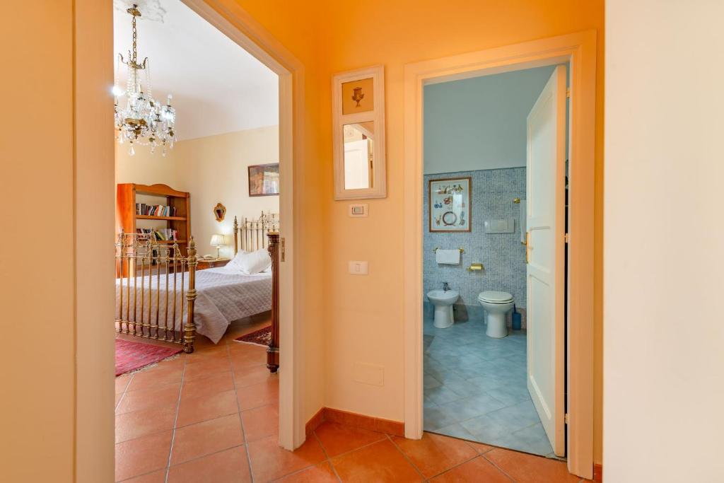 Posteľ alebo postele v izbe v ubytovaní La casa di Dante