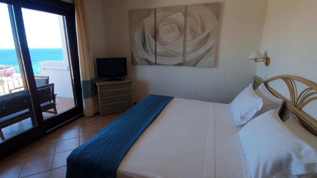 Postel nebo postele na pokoji v ubytování Hotel Mon Repos