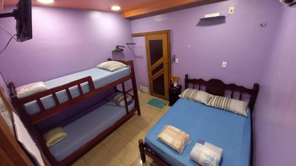 Postel nebo postele na pokoji v ubytování APART HOTEL MANAUS - Un 614