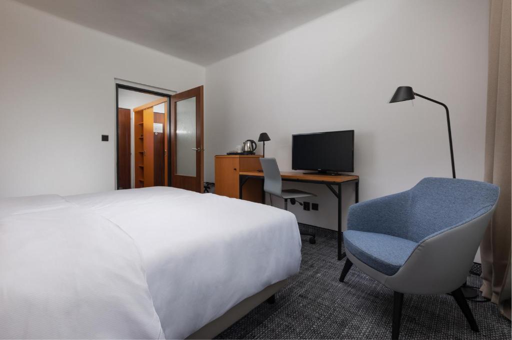 TV a/nebo společenská místnost v ubytování OREA Hotel Špičák Šumava