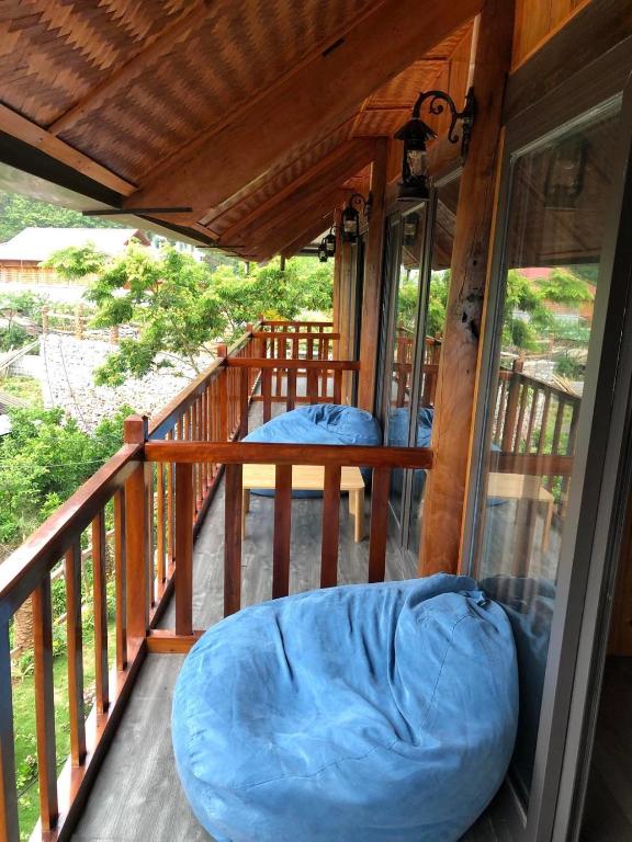 Balkón nebo terasa v ubytování DONG VAN CLIFFSIDE HOUSE