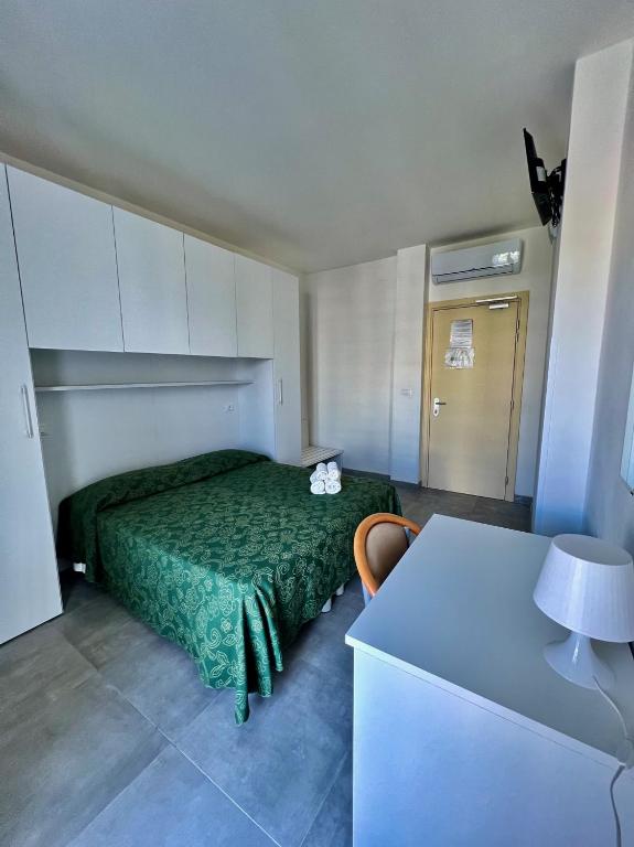 Postel nebo postele na pokoji v ubytování Hotel Terramare