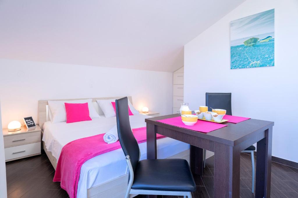 Postel nebo postele na pokoji v ubytování Villa Fio - Rooms & Studio