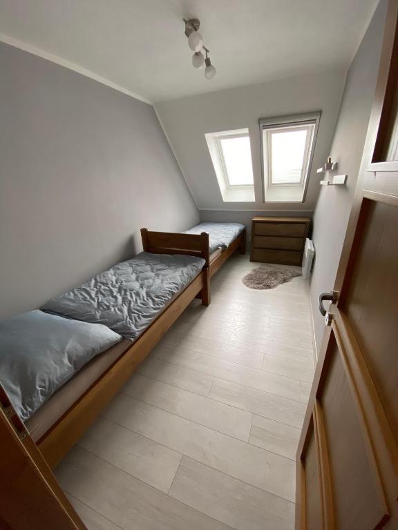 Postel nebo postele na pokoji v ubytování Apartmány u Moravčíků